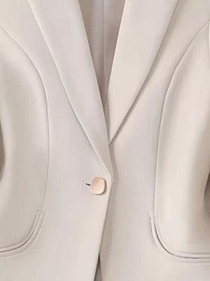 100% polyester Care instructions: Machine wash cold blazer in Dusty Pink with slim silhouette