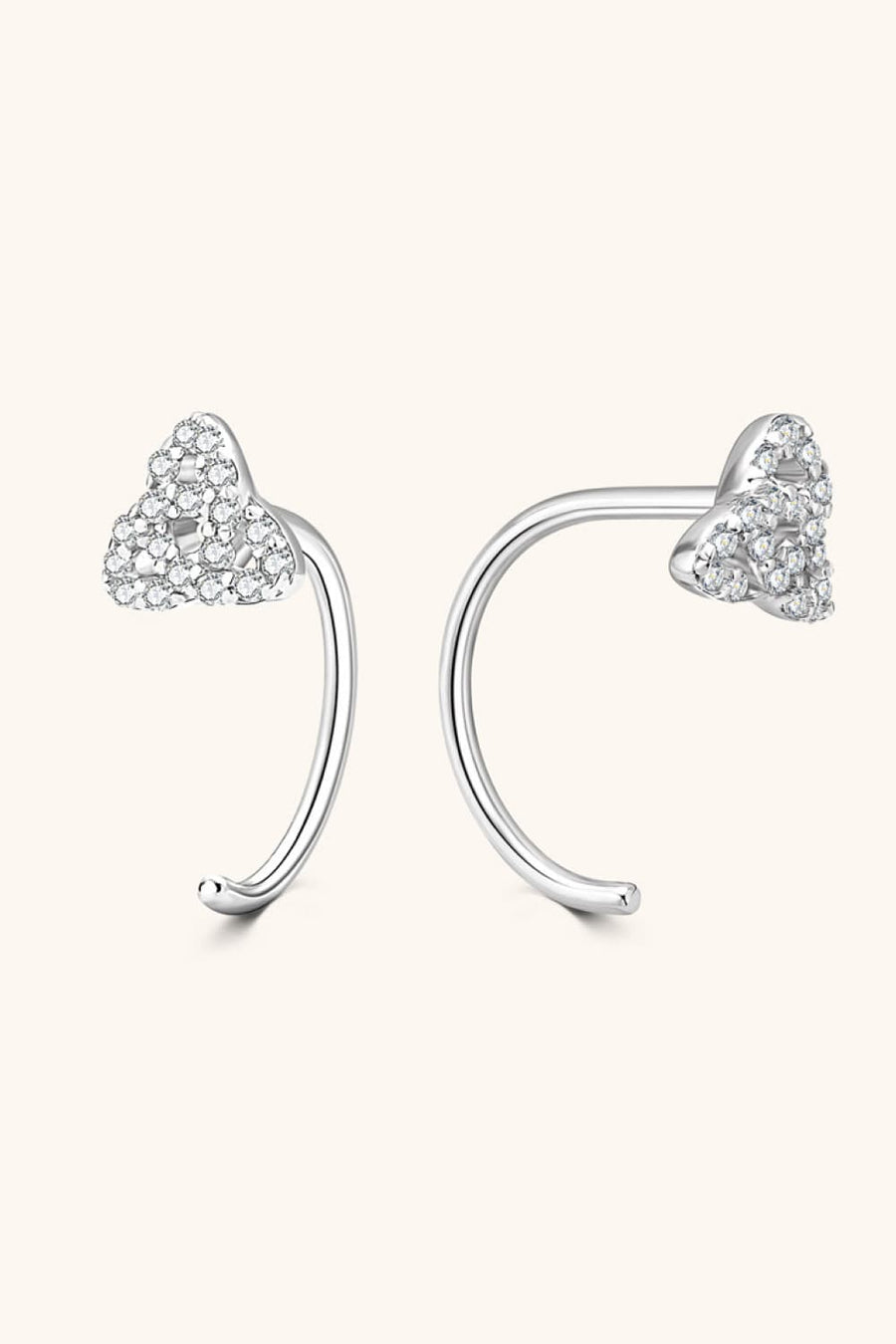 Silver diamond-dusted crescent ear climbers with heart-shaped tops