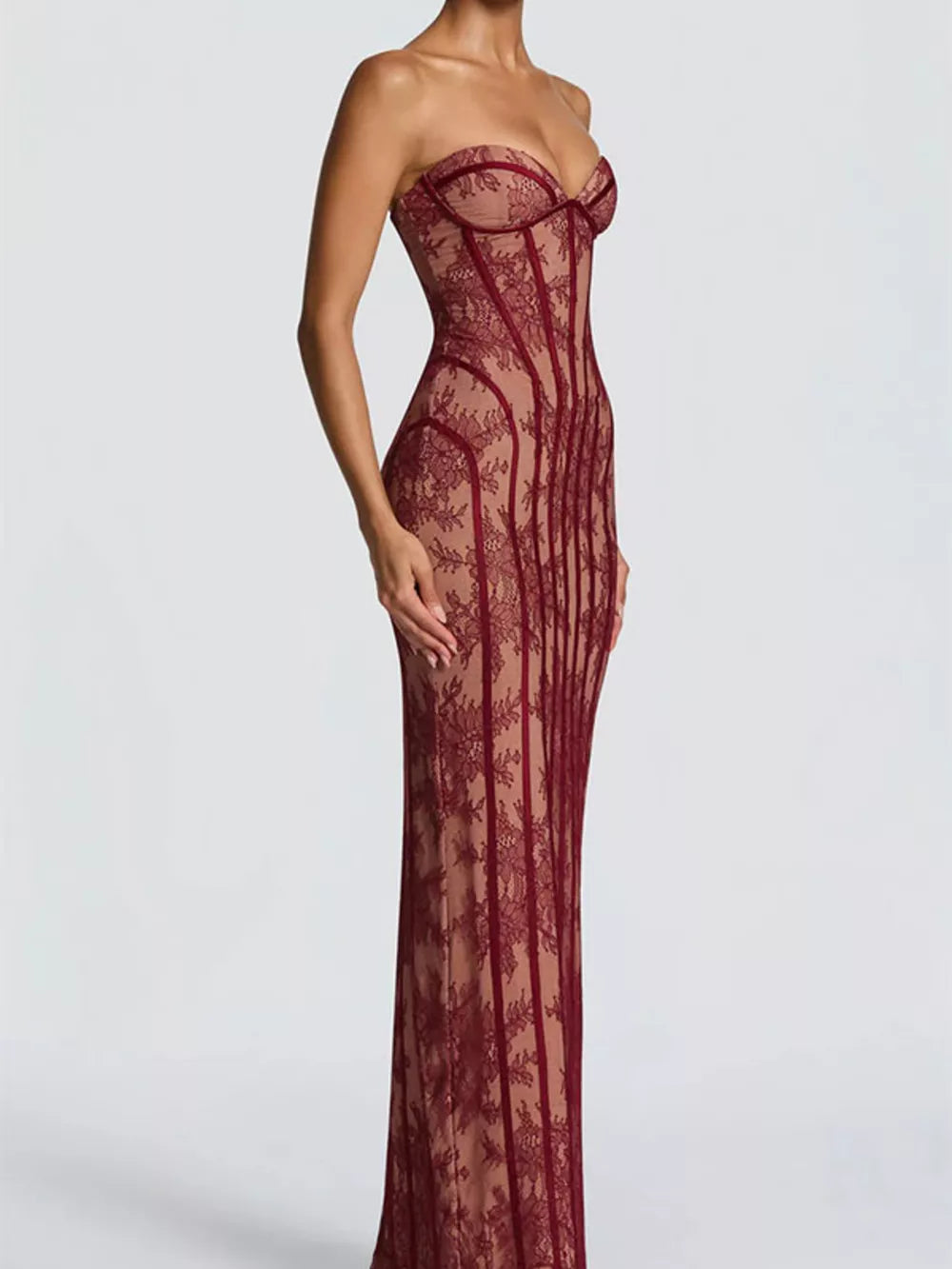 Burgundy lace sweetheart neckline maxi dress with corset detail and sheer overlay.