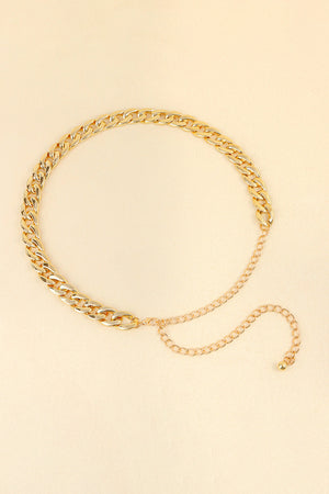 Gold chunky curb chain belt with adjustable extender chain and ball end.