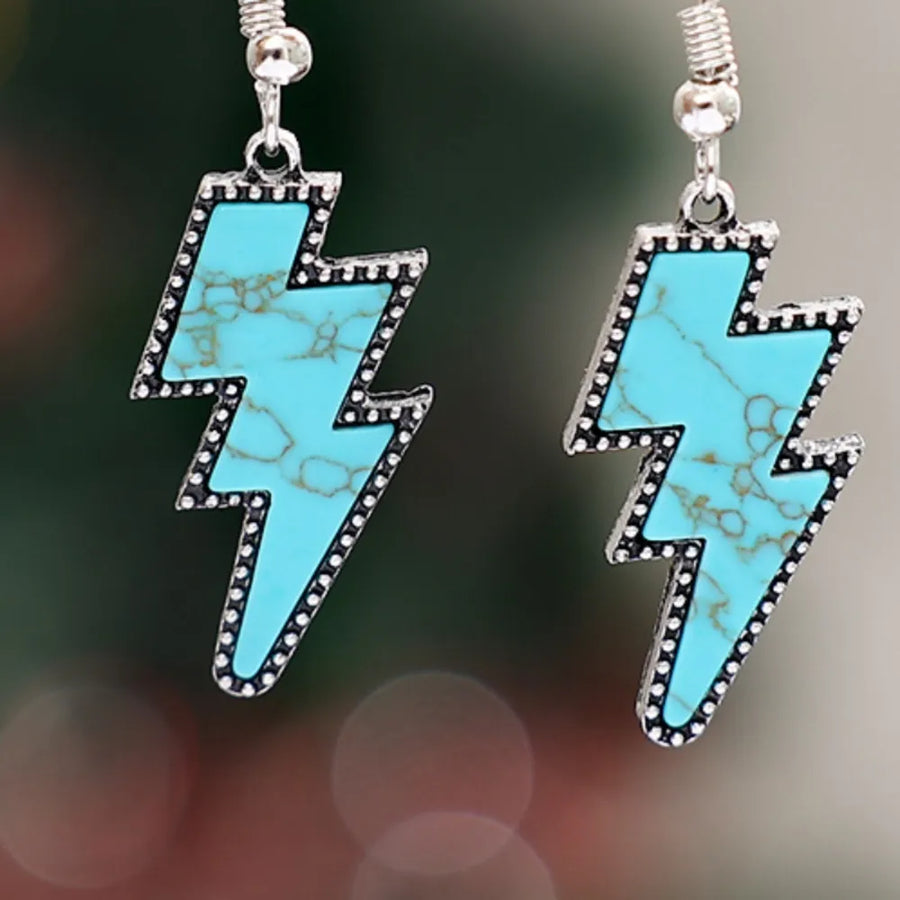 Turquoise bolt drop earrings with silver trim and beaded detail.