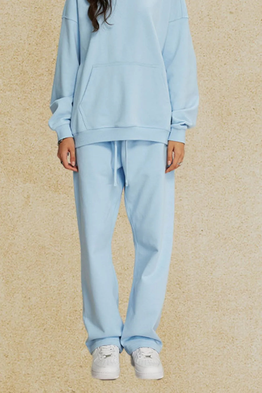 Light blue relaxed fit lounge trousers with drawstring waist.