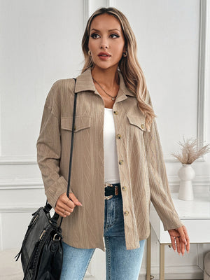 Camel utility jacket with diamond weave pattern, button front and chest pockets.