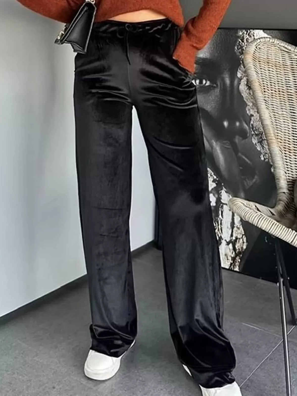 Black velvet tied wide-leg trousers with a comfortable fit
