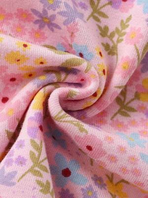 Pastel floral print A-line dress for baby girls in pink cotton with ruffles.