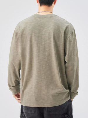 Oversized Khaki Color cotton long-sleeve tee with crewneck, relaxed fit.