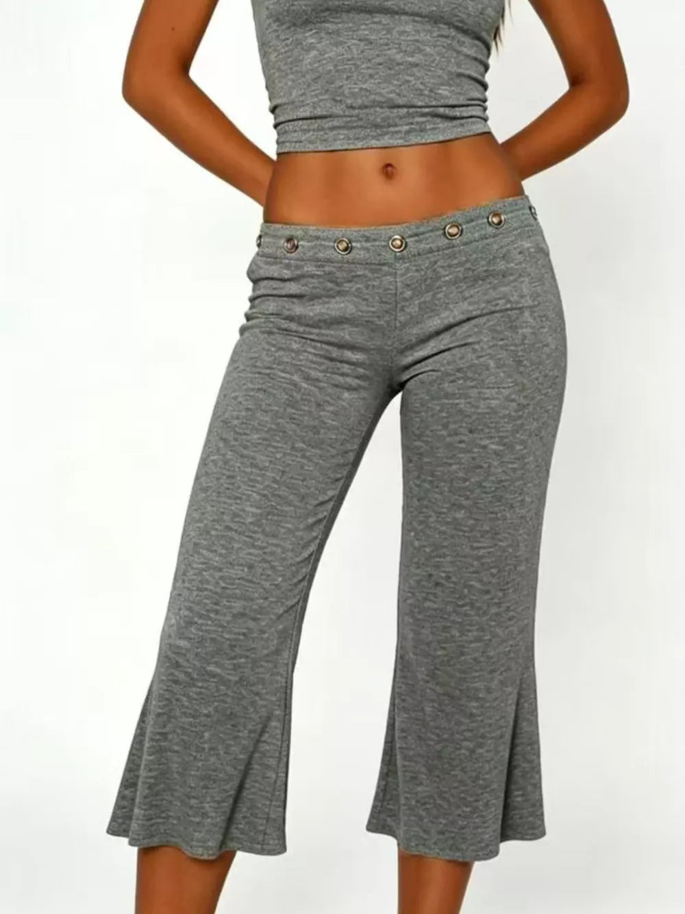 Light gray flared hem capri pants with button detail waist