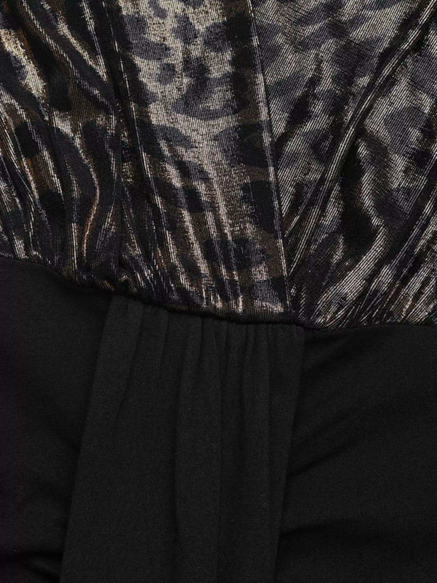 Black ruched long-sleeve dress with metallic animal print bodice and slit detail.