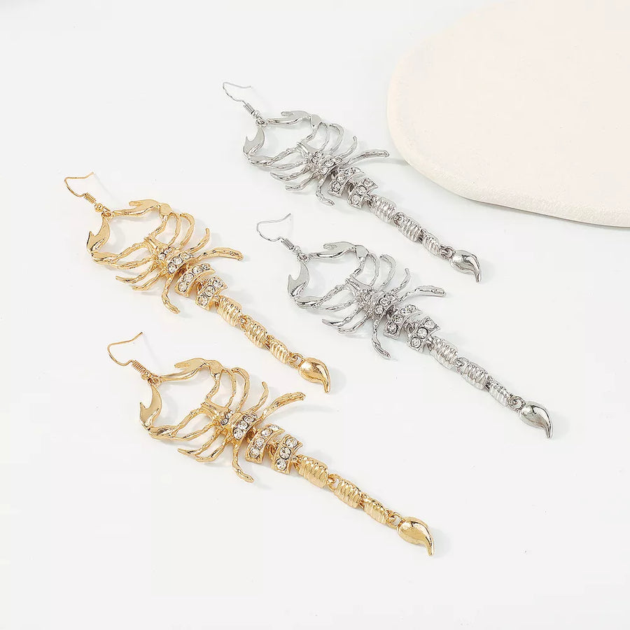 Gold earrings with rhinestone accents and not applicable