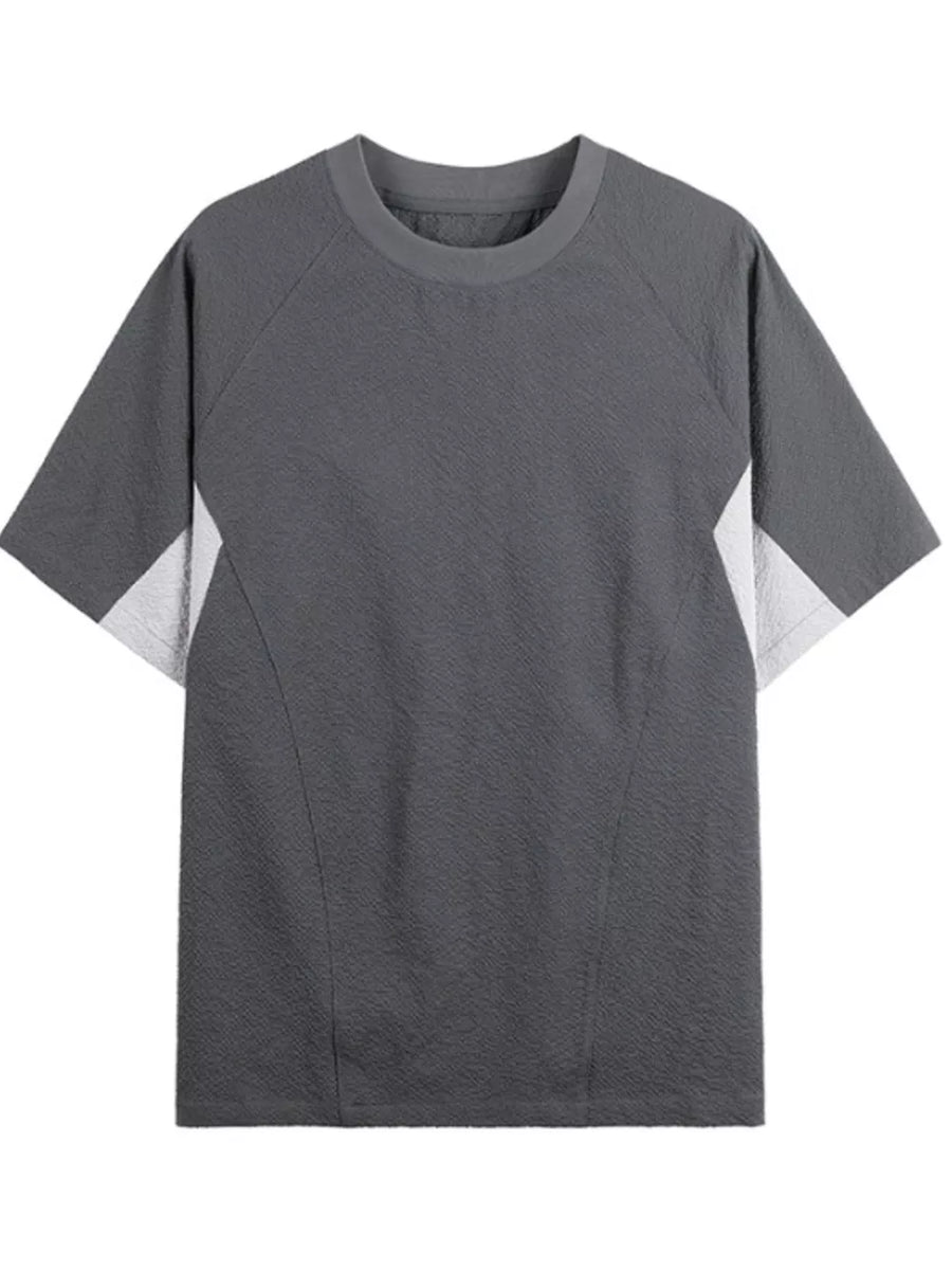 Men's dark gray textured t-shirt with contrast white panels and crew neck.