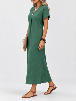 Light Blue midi dress featuring decorative button and ribbed