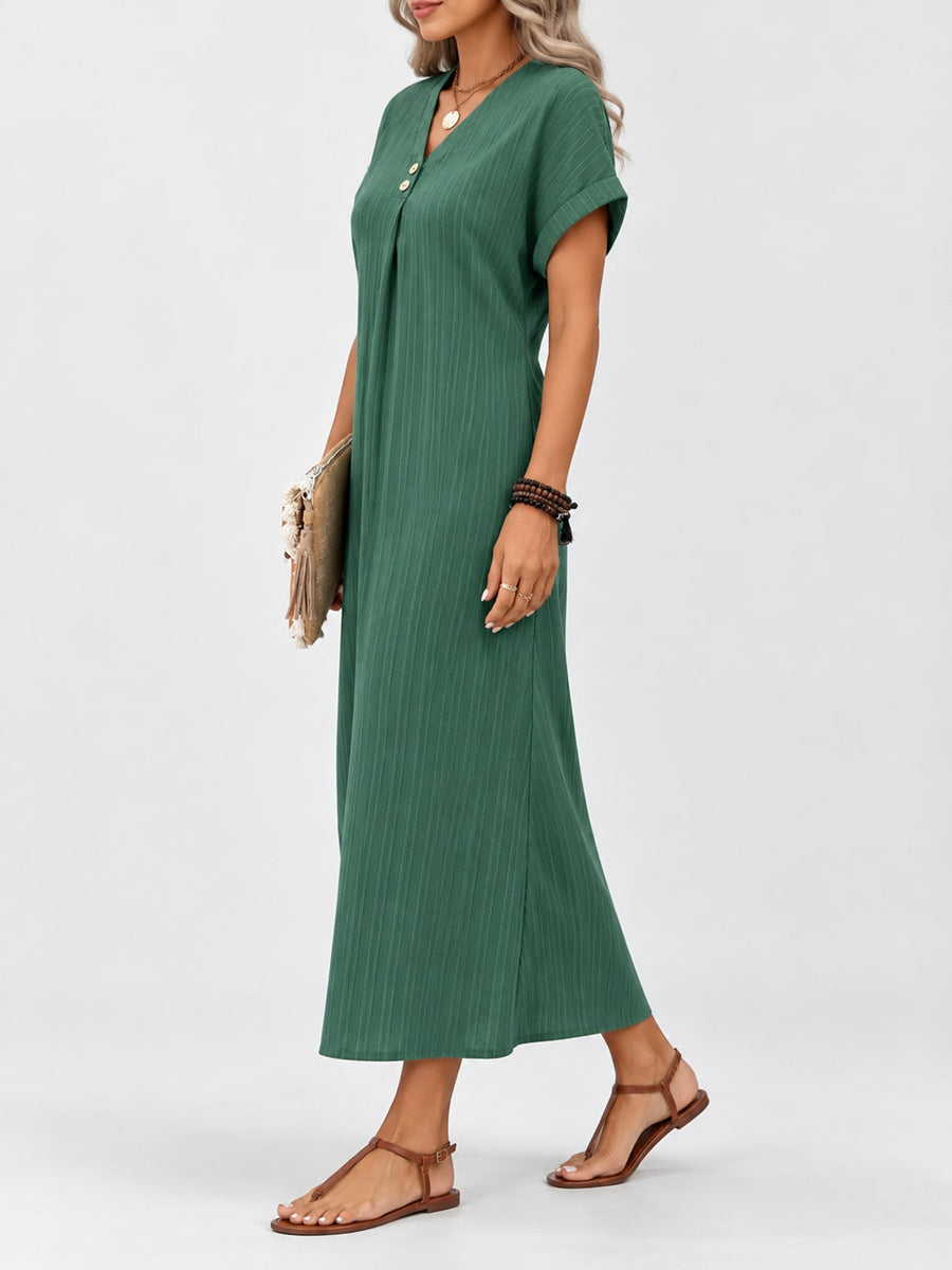 Light Blue midi dress featuring decorative button and ribbed