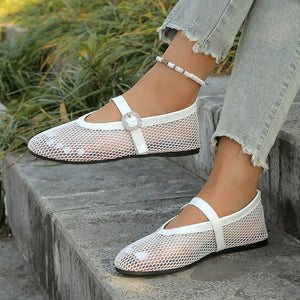 White mesh ballet flats with buckle detail and ankle strap.