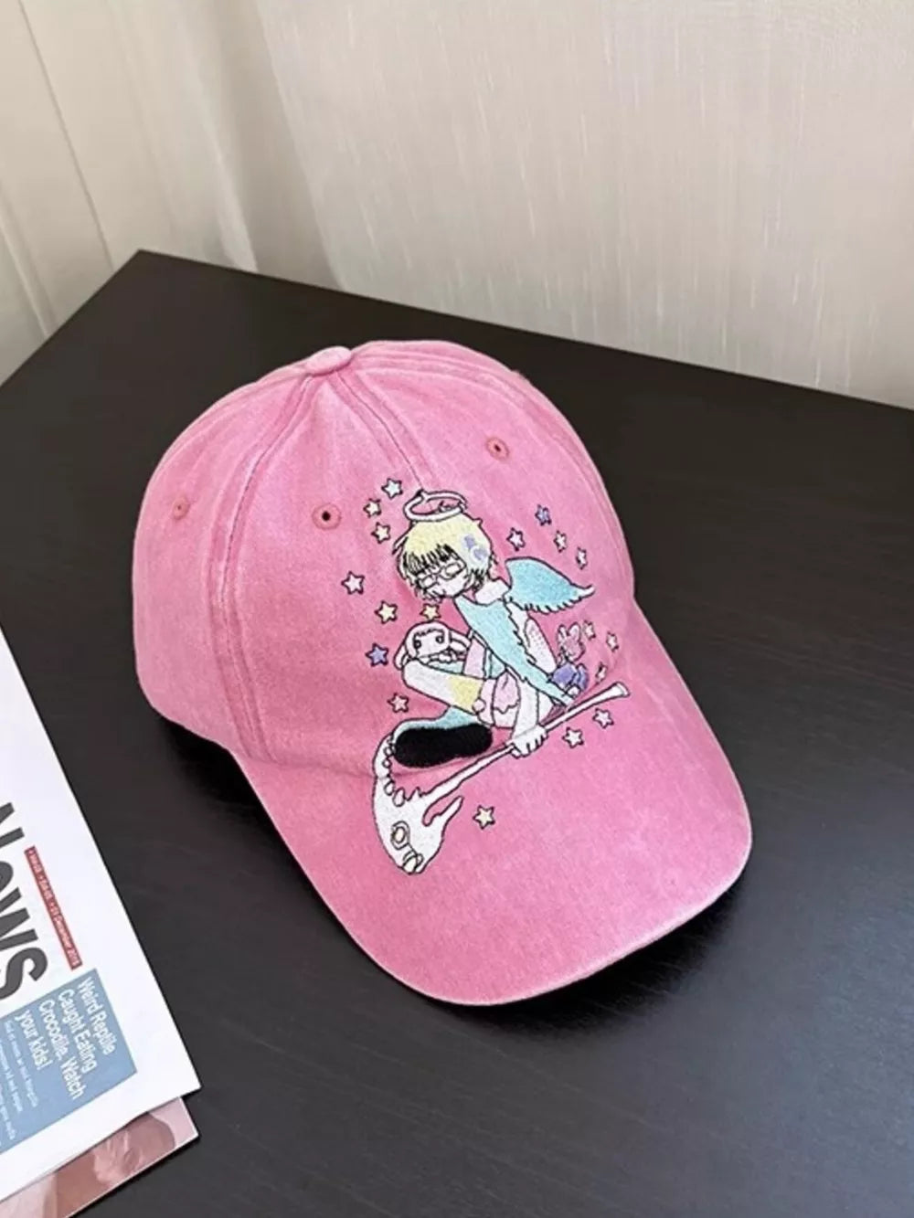 Pink cotton baseball cap with whimsical angel embroidery and stars