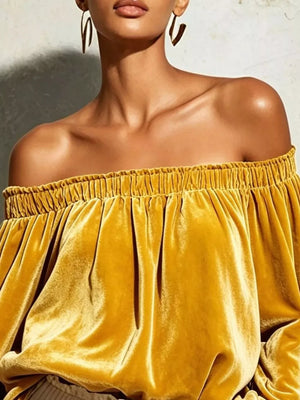 100% polyester Care instructions: Machine wash cold off-shoulder top in Pale Blush with relaxed silhouette