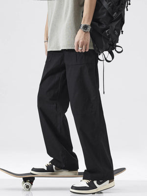 Black relaxed fit cargo pants with multiple pockets and a casual style.