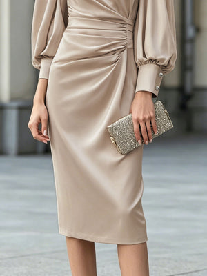 100% polyester Care instructions: Machine wash cold midi dress in light beige with fitted silhouette