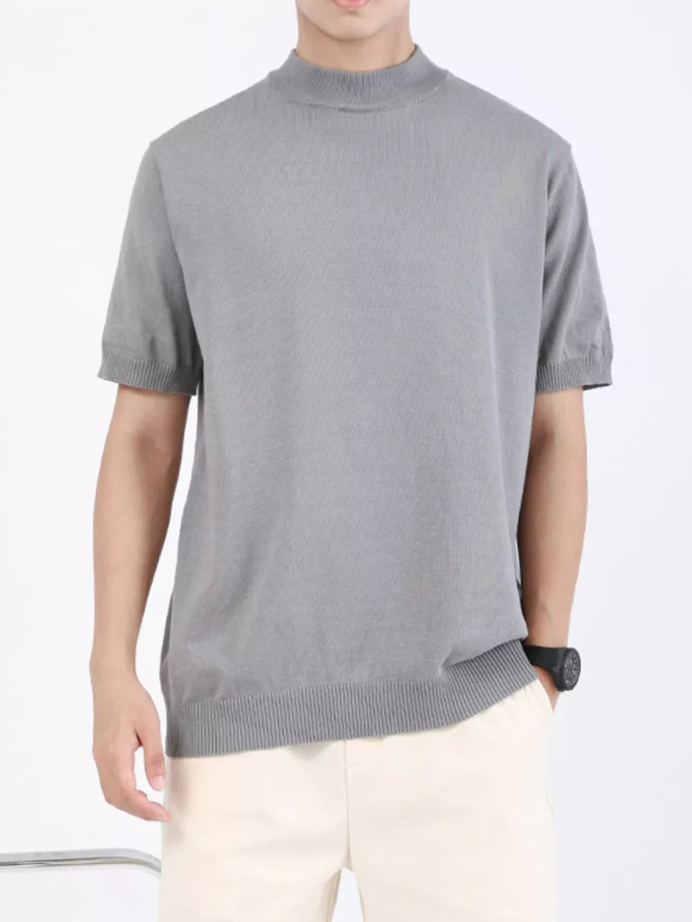Men's medium gray knitted mock neck t-shirt with short sleeves and ribbed hem.