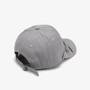 Gray baseball cap with adjustable strap and tied-back detail