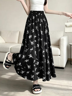 A-line skirt in Black with elastic waist and maxi