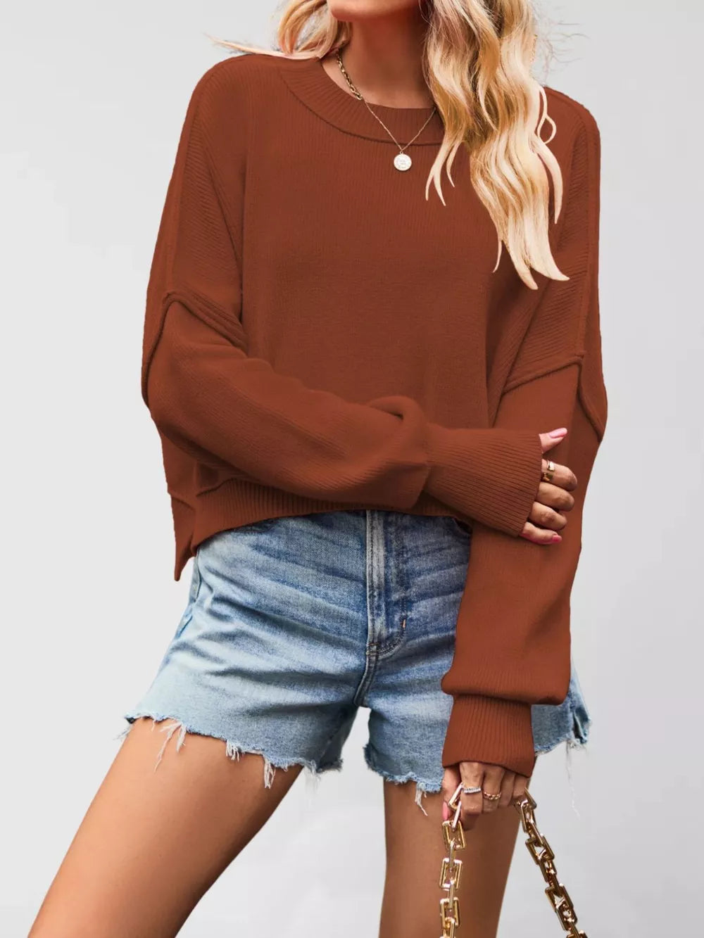 Khaki crewneck sweater with raw hem and long sleeve