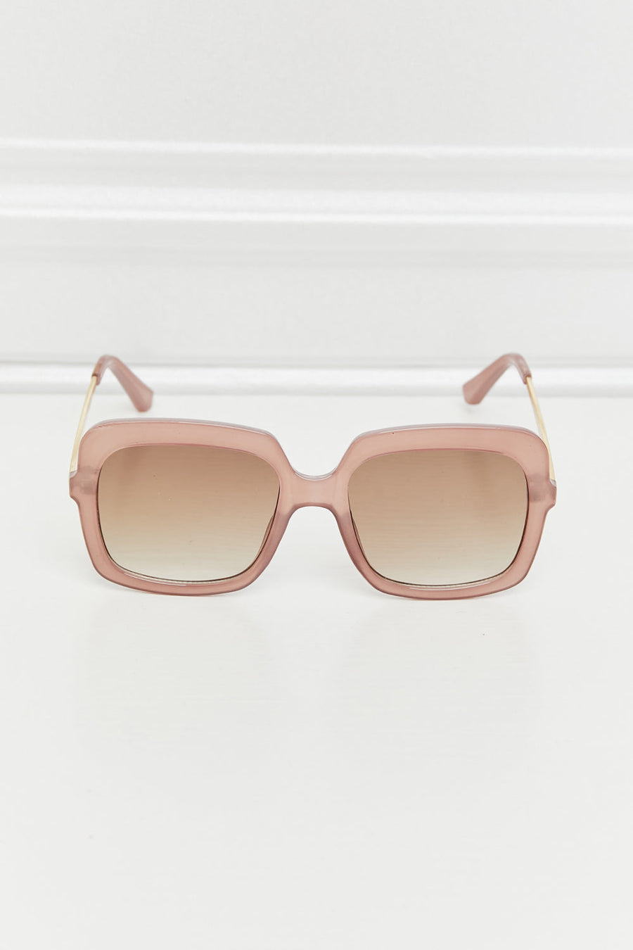 Sculpted square frame sunglasses in khaki with gradient brown lenses and gold temples.