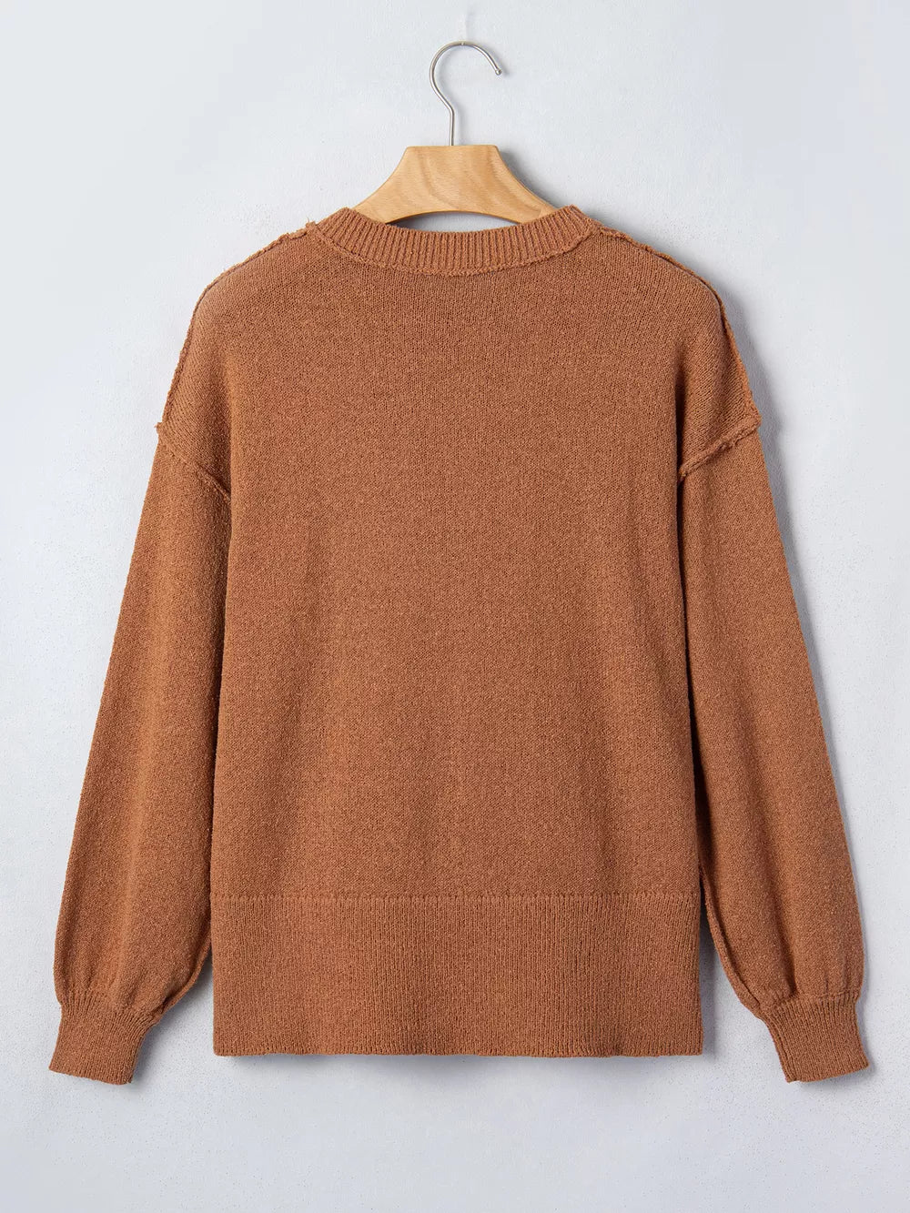 rust pullover sweater with ribbed cuffs and long sleeve