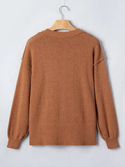rust pullover sweater with ribbed cuffs and long sleeve