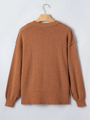 rust pullover sweater with ribbed cuffs and long sleeve