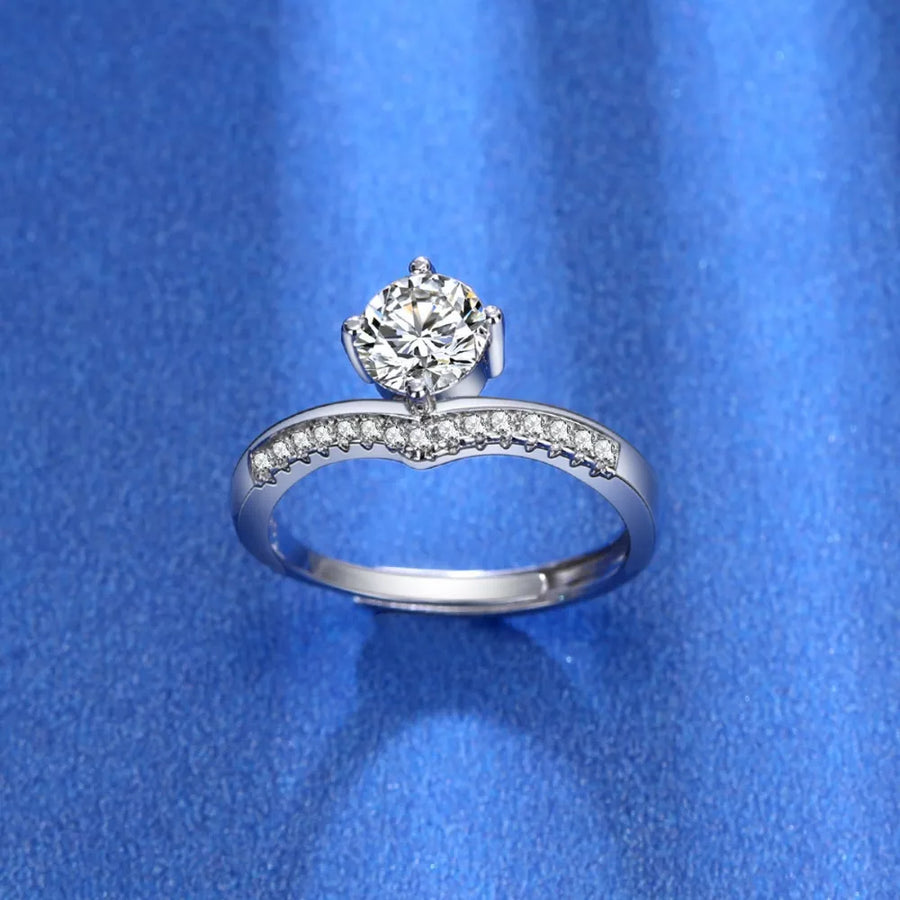 925 sterling silver,Moissanite Carat weight: 1ct Care instructions: Avoid wearin ring in clear with band silhouette