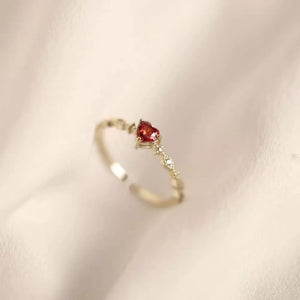 ring in gold featuring heart motif and fitted fit