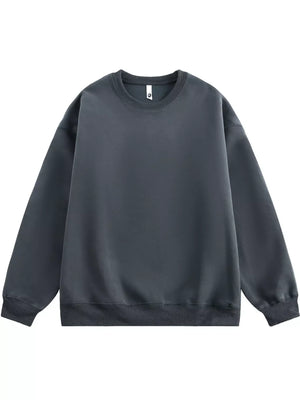 Oversized crew-neck sweatshirt in dark gray with ribbed cuffs and hem.