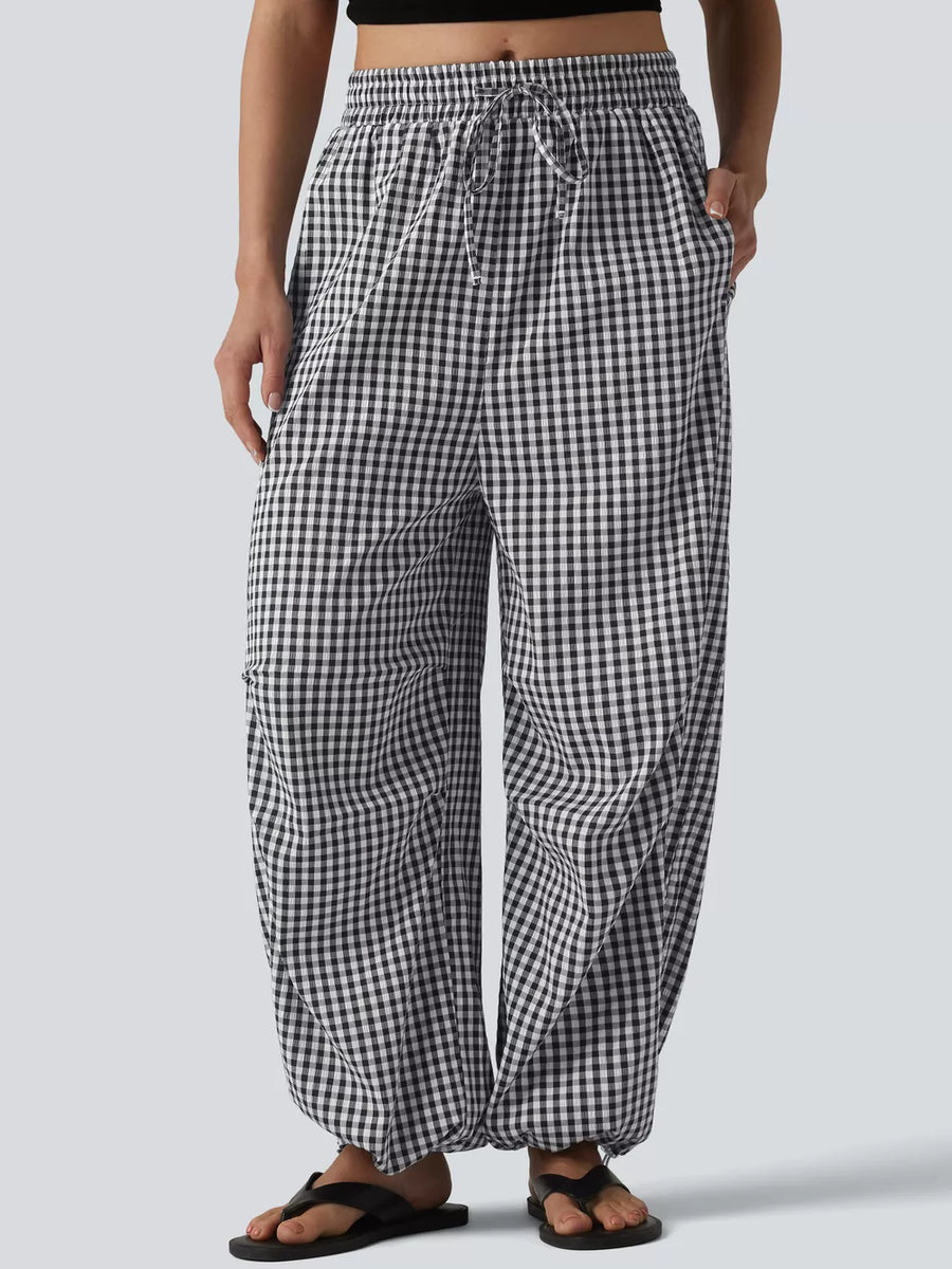 wide-leg pants featuring gingham in white with 100% viscose Care instructions: Machine wash cold texture