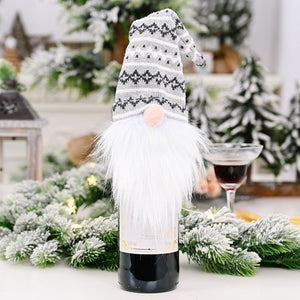 Festive gnome bottle topper in Style A with gray knit hat and white faux fur beard.