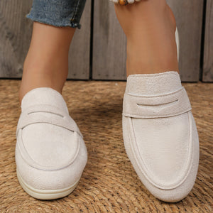 Textured round toe slip-on loafers in Khaki with a backless design.