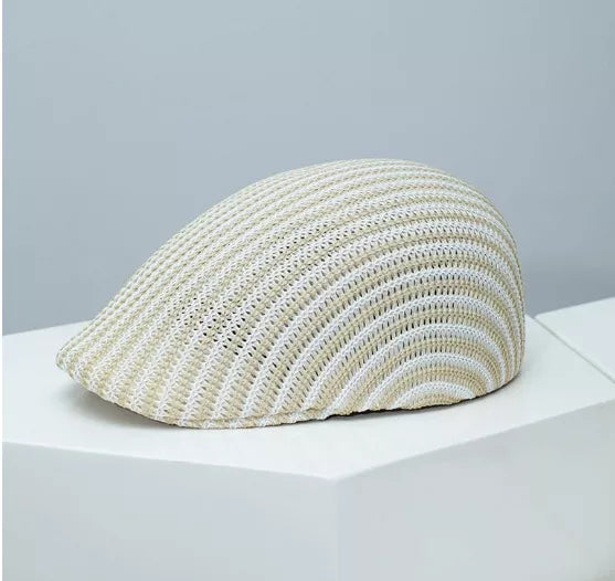 Textured striped beret in beige and white, made of breathable knit material.