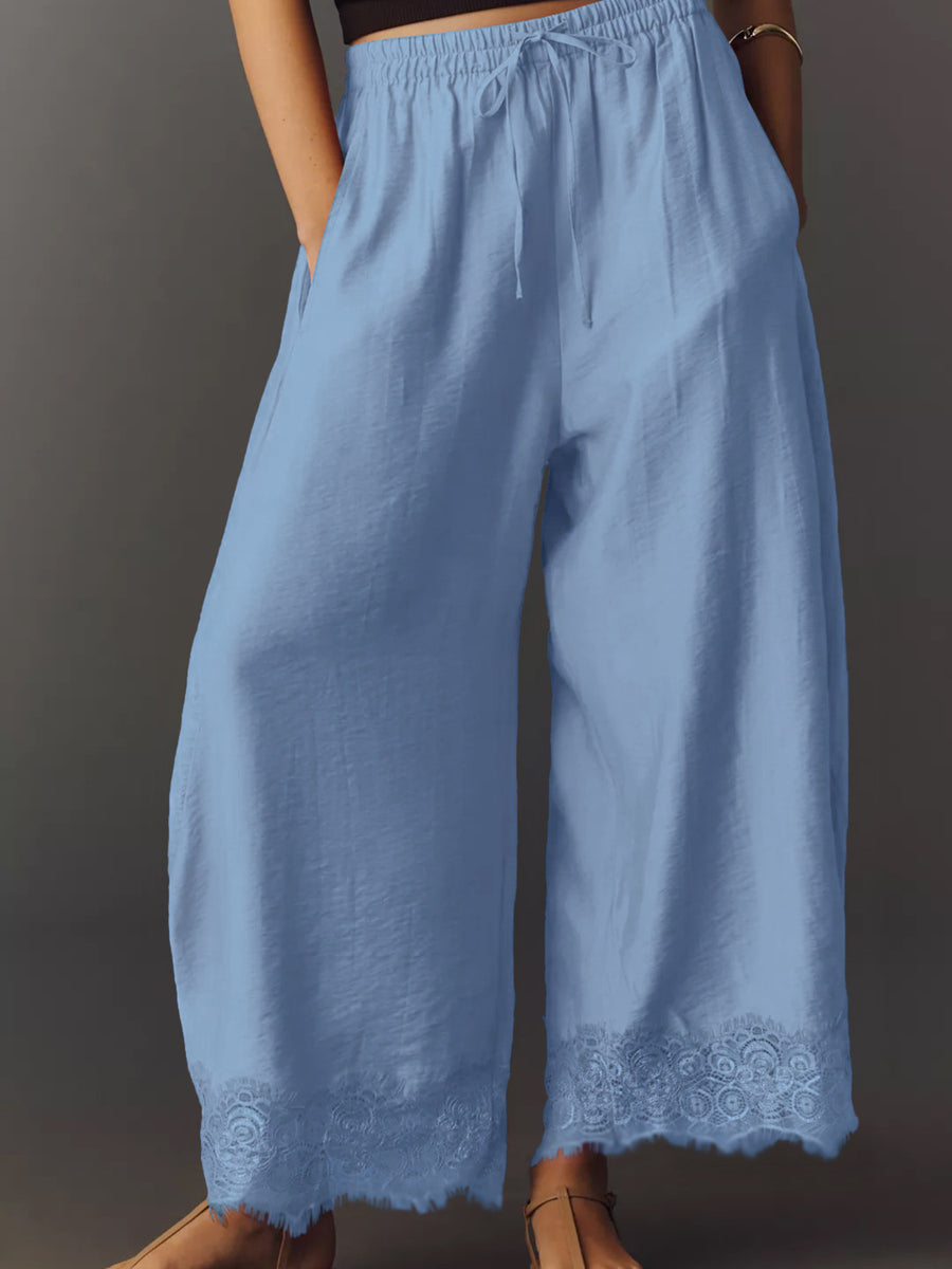100% polyester Care instructions: Machine wash cold wide-leg pants in White with loose silhouette