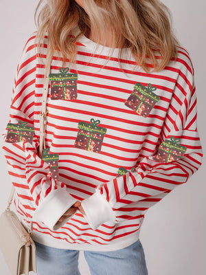 Red and white striped sweatshirt with sequin gift appliques.