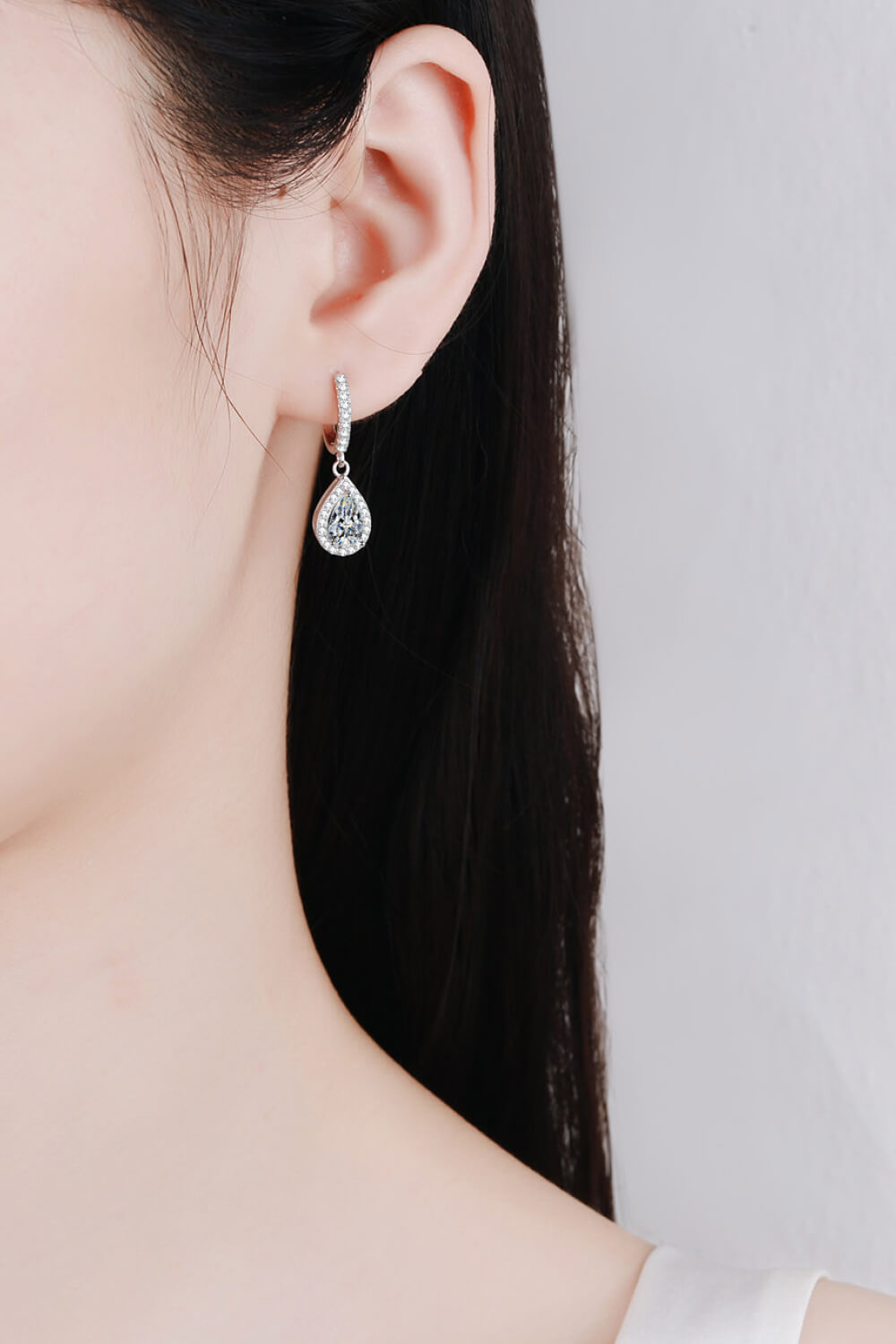 Silver teardrop halo hoop earrings with pavé detail on 925 sterling silver