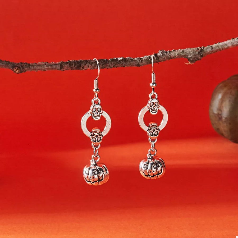 Alloy, Silver-plated Care instructions: 1 earrings in silver with dangle silhouette