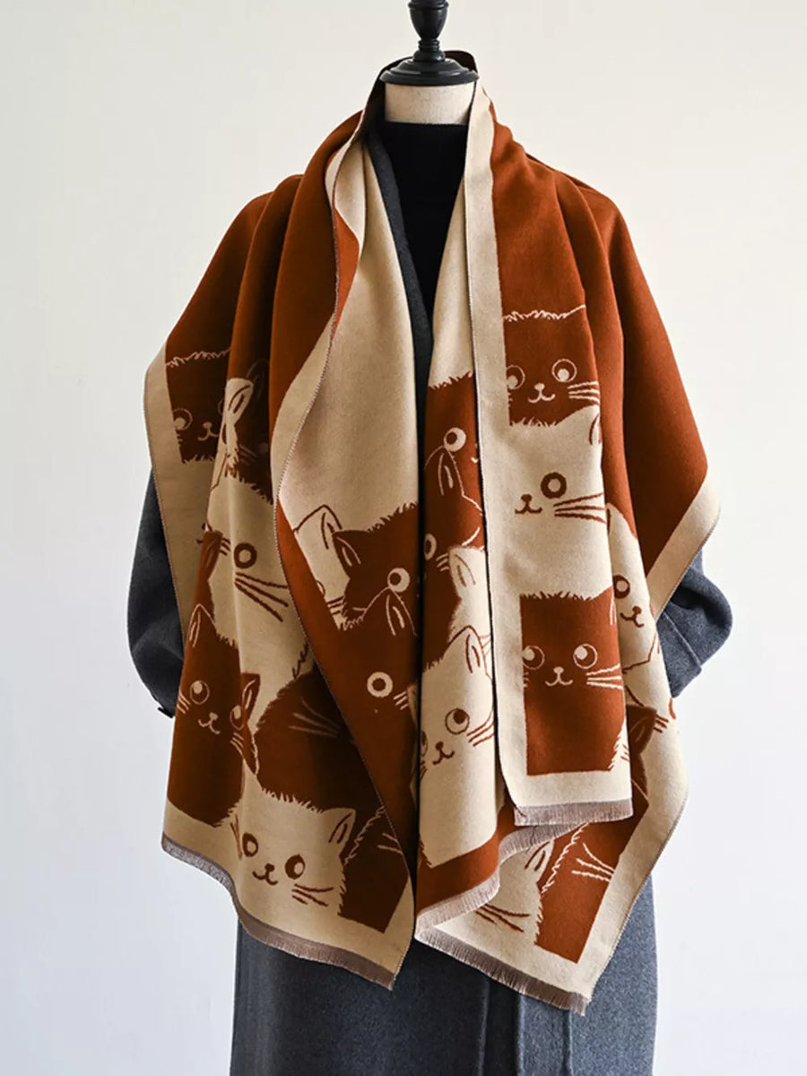 Reversible scarf in brown and beige with a cute cat pattern.
