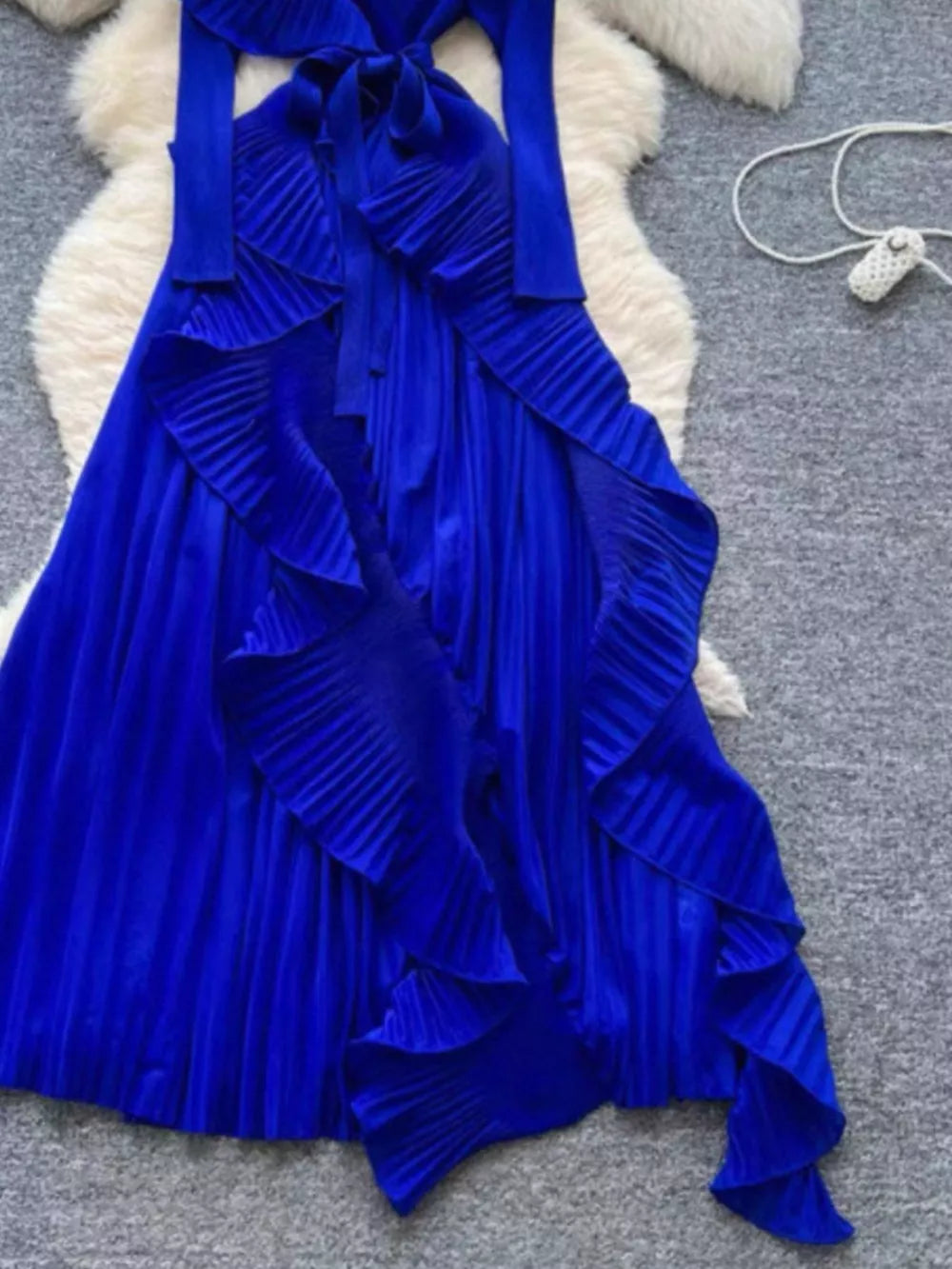 Royal blue midi dress with ruffled pleated skirt and tie neck