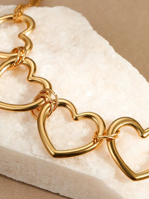 necklace in gold with heart and heart motif