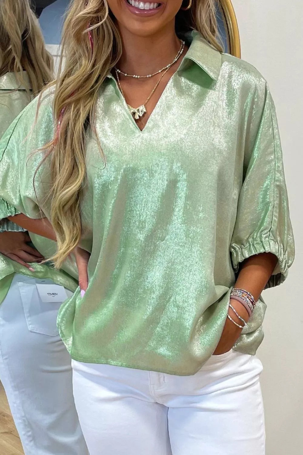 Textured Johnny collar blouse in Gum Leaf with elastic cuffs and V-neck.