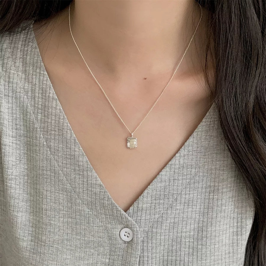 Freshwater Pearl,925 sterling silver Care instructions: Avoid wearing during exe necklace in Silver with NA silhouette