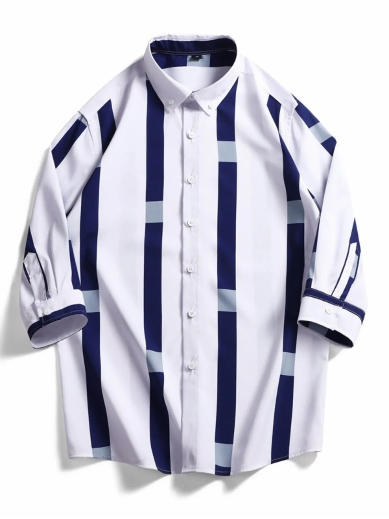 Oversized button-up shirt with white, navy, and light blue stripes.