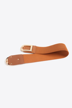 Caramel elastic belt with double gold buckles and faux leather accents.