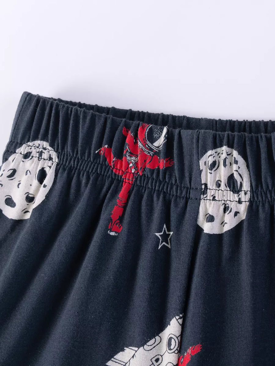 Children's dark gray cotton shorts with astronaut and rocket print.