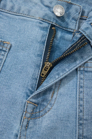 Light wash denim shorts with patch pockets and a zipper fly detail.