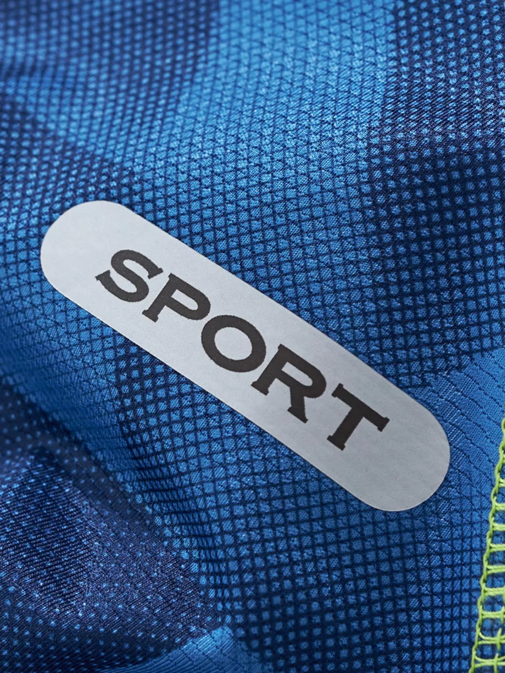 Toddler boys' sport set in dark blue with a vibrant geometric print and a silver "SPORT" logo detail.